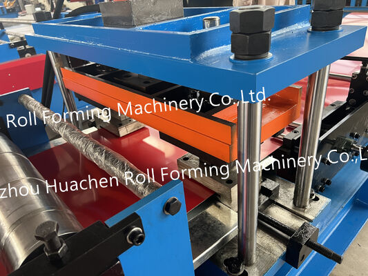 Trilobal metal rolling machine for forming wall panels and roof panels into a trapezoidal shape